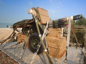 A Mpdel 56 pack howitzer in its parachute delivery mode.