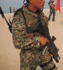 A paratrooper with an M4 Carbine with sights and grenade launcher.