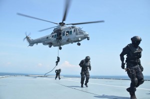 RMAF Airbus Helicopter H225M Cougar delivering SF soldiers during an exercise on the South China Sea in 2014. Joint Force picture.