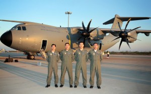 The crew of M54-01posed in front of M54-01 before the ferry flight.