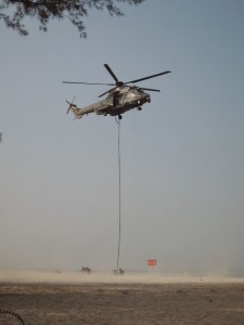 GGK troops coming down from a RMAF H225M Cougar helicopter.