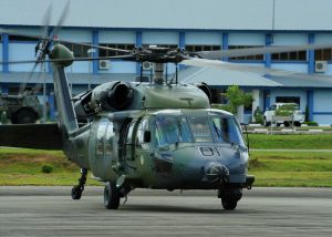 His Majesty Sultan Haji Hassanal Bolkiah, Sultan of Brunei, arrivals at the 4th biennial Brunei Darussalam International Defense Exhibition aboard a UH-60 Black Hawk helicopter on the flightline at Rimba Air Base, Dec. 3, 2013.  USAF photo