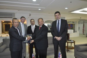 Confirming the deal. Kementerian Pertahanan Secretary General Datuk Seri Abdul Rahim Radzi (left0 handing over the contract document to Weststar Group Managing Director, Tan Sri Syed Azman 