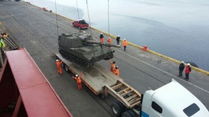 A M109-A5 howitzer is offloaded and craned onto a trailer at the port in Punta Arenas, Chile, in December, 2014. The self-propelled howitzer was one of 12 purchased by the Chilean army through the U.S. Army Security Assistance Command's foreign military sales program.