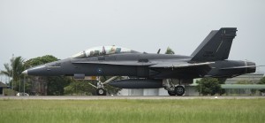 A Royal Malaysian Air Force (RMAF) F/A-18D M45-02 Hornet aircraft lands at RMAF base Butterworth, Malaysia, June 11, 2014, during Cope Taufan 2014.  Note the bomb markings on the nose. U.S. Air Force photo.