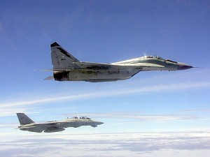 RMAF Mig-29N Fulcrum flies with a US Navy Tomcat. US Navy.