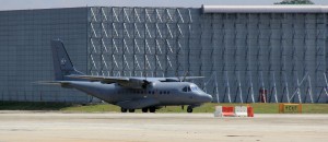 RMAF CN235 M44-05 taxis past one of the new hangars built at Subang specifically for the A400M. This hangar is built for the maintenance of the Atlas.