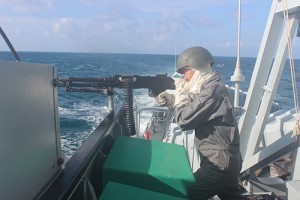 A sailor from KD Gempita conducting training on a GPMG during an exercise in early 2016. RMN  picture