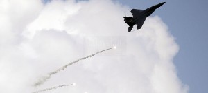 RSAF Strike Eagle firing flares as part of its display routine.