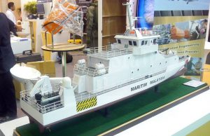 An aft view of the NGPC model at Destini Bhd booth. The upper deck where the two guns are located will also be used to fix the next to recover the Fulmar UAS.
