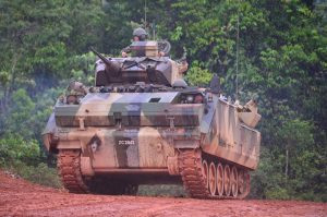 An Adnan ACV with 25mm Bushmaster turret at the firing exercise. Army picture