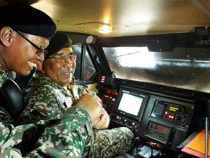 Deputy Minister Datuk Johari Baharum pictured inside the cabin of a MLRS launcher vehicle. This is the first public picture of the inside of  a MRLS vehicle. Kementerian Pertahanan picture.