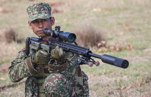 A member of the Army shooting team taking part in the Sniper competition of AASAM 2016 with an Accuracy International AX rifle. Australian Army - FB