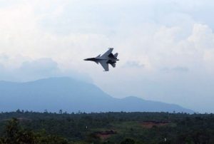 An Su-30MKM Flanker conducting a fly-past after conducting its bombing run. The aircraft was flying around 500 ft AGL when this picture was taken.