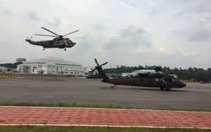 PUTD Nuri helicopter lands next to a US Army Blackhawk during Keris Strike 2016. US Army picture