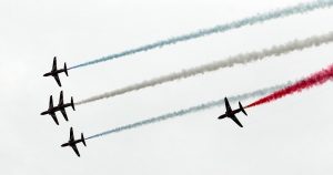 The formation with a singleton performing the cork screw over the smoke.