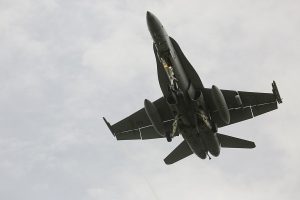 A Royal Australian Air Force 77 Squadron F/A-18A Hornet has landing gear down and is ready to land at Royal Malaysian Air Force Base Butterworth during Exercise Bersama Lima 16. CA