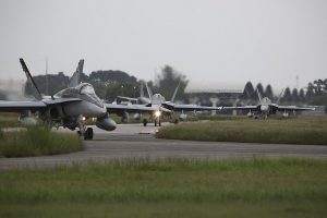 "Highway to the danger zone". Three Royal Australian Air Force 77 Squadron F/A-18A Hornets taxi towards the take off area at Royal Malaysian Air Force Base Butterworth during Exercise Bersama Lima 16. CA