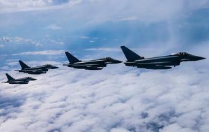 Four of the eight Typhoons lining up beside the RAF Voyager. Crown Copyright